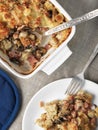 Baked dumplings, ham, mushroom and cheese dish Royalty Free Stock Photo