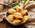 Baked dumplings stuffed with curd cheese and potatoes in a pan Royalty Free Stock Photo