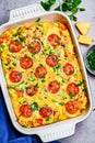 Baked egg omelet frittata with tomatoes and cheese in oven dish, Top View Royalty Free Stock Photo