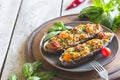 Baked eggplant. aubergine stuffed with vegetables and cheese Royalty Free Stock Photo