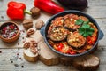 Baked eggplant with peppers, garlic, tomatoes and walnuts. Cold or hot appetizer