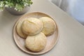 Baked english scone serve for coffee break on wooden dish