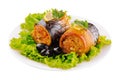 baked fillet of mackerel in rolls with carrots and onions