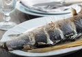 Baked sea bass with lemongrass on luxury porcelain dish