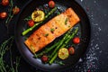 Baked fish with asparagu in the plate