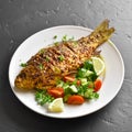 Baked fish on plate Royalty Free Stock Photo