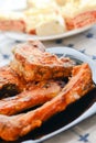 Fish stakes on plate served on home table