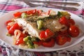 Baked Flounder with peppers and broccoli close-up. horizontal