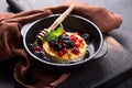 Baked or fried Camembert or brie cheese with berry and honey. Gourmet Breakfast. Selective focus Royalty Free Stock Photo