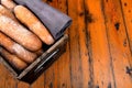 Baked goods in rustic basket on wooden table, top area left empty for message or branding Royalty Free Stock Photo