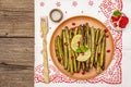 Baked green bean casserole topped with sesame seeds, pomegranate, mint and lemon Royalty Free Stock Photo