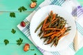 Baked green beans and carrots - vegan diets.