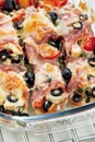 baked ham rolls filled with chicken meat and black olives Royalty Free Stock Photo