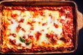 Baked Italian lasagna pasta with cheese, tomato sauce and crust