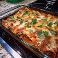 Baked lasagna with meat, cheese and vegetables in a metal tray