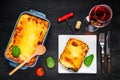 Baked Lasagna Served with Rose Wine Royalty Free Stock Photo