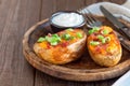 Baked loaded potato skins with cheddar cheese and bacon, garnish Royalty Free Stock Photo