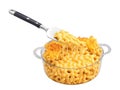 Baked mac and cheese, corkscrew pasta in sharp cheddar sauce, crispy baked cheese topping, heaped on spatula Royalty Free Stock Photo