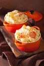 Baked macaroni with cheese in orange casserole Royalty Free Stock Photo