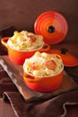 Baked macaroni with cheese in orange casserole Royalty Free Stock Photo
