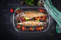 Baked mackerel with herbs and lemon and vegetables. Healthy dinner. Royalty Free Stock Photo