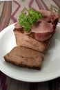 Baked meat loaf with parsley on a plate Royalty Free Stock Photo