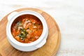 Baked meat with potatoes and vegetables in a bowl. Ukrainian traditional cuisine. Top view. Royalty Free Stock Photo