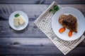 A large piece of baked meat Still life on a light wooden table Royalty Free Stock Photo