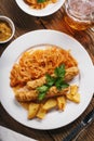 Baked Munich sausages with stewed cabbage and a glass of beer Royalty Free Stock Photo