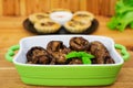 Baked mushrooms with mushrooms. Grilled champignons Royalty Free Stock Photo