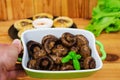 Baked mushrooms with mushrooms. Grilled champignons Royalty Free Stock Photo