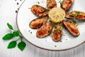 Baked mussels with cheese on plate Royalty Free Stock Photo
