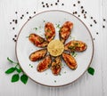 Baked mussels with cheese on plate Royalty Free Stock Photo