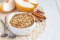 Baked oatmeal with nuts, almond milk, spices and asian pear Royalty Free Stock Photo