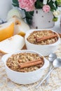 Baked oatmeal with nuts, almond milk, spices and asian pear Royalty Free Stock Photo