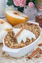 Baked oatmeal with nuts, almond milk, spices and asian pear Royalty Free Stock Photo