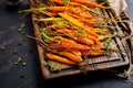 Baked organic carrots with thyme, honey and lemon. Organic vegan foodBaked organic carrots with thyme, honey and lemon.