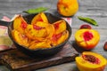 Baked peaches on a cast iron pan