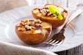 Baked peaches with sugar and nuts