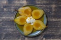 Baked pears in orange juice with ice cream, close up. Delicious dessert Royalty Free Stock Photo