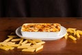 Baked penne pasta with tomato sauce and cheese Royalty Free Stock Photo