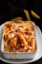 Baked penne pasta with tomato sauce and cheese Royalty Free Stock Photo