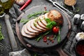 Baked piece of pork with rosemary. Top view.