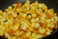 Baked pieces of potatoes Royalty Free Stock Photo