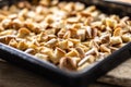 Baked pieces of rolls on a baking sheet, ready to make Karlovy Vary dumplings