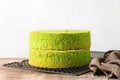 Baked plain spinach and pistachio sponge cake on the cooking iron grid. Fluffy,