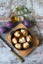 Baked plums with white cheese. Vegetarian snack. Selective focus. Macro.