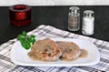 Baked pork chops with mushroom gravy.