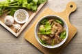 Baked Pork Ribs with Glass Noodles.Thai Style marinade pork by mixing the oyster sauce and soy sauce,topping with celery in white Royalty Free Stock Photo