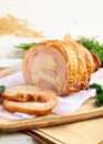 Baked pork roll filled with herbs Royalty Free Stock Photo